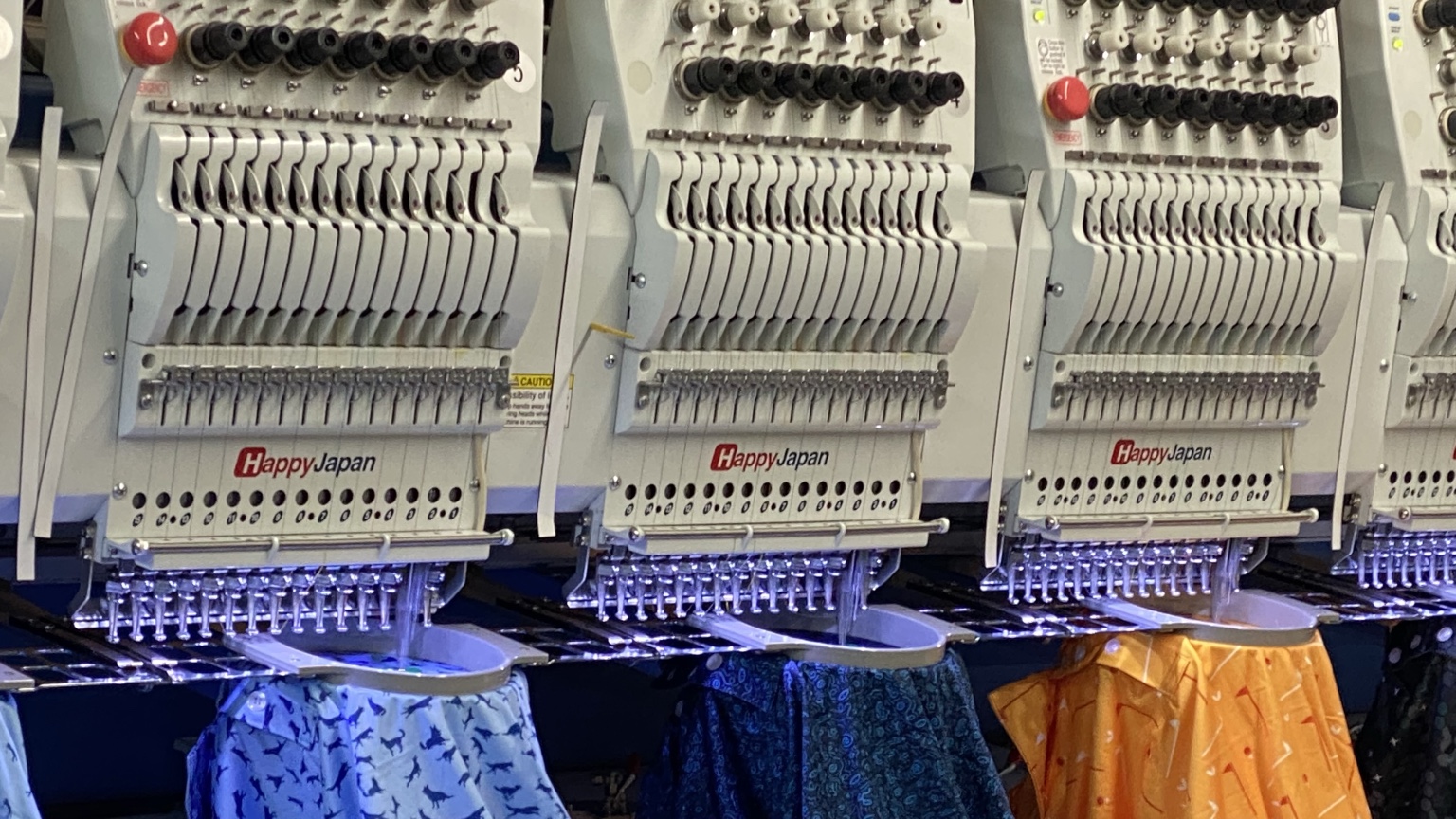 HappyJapan embroidery machines working on apparel